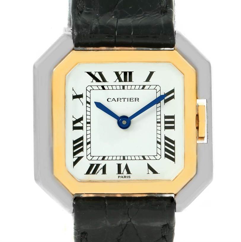 The image shows a close-up view of the Cartier Tank Classic Women's Yellow Gold White Dial Women's Yellow Gold White Dial watch face and a portion of its black leather strap.