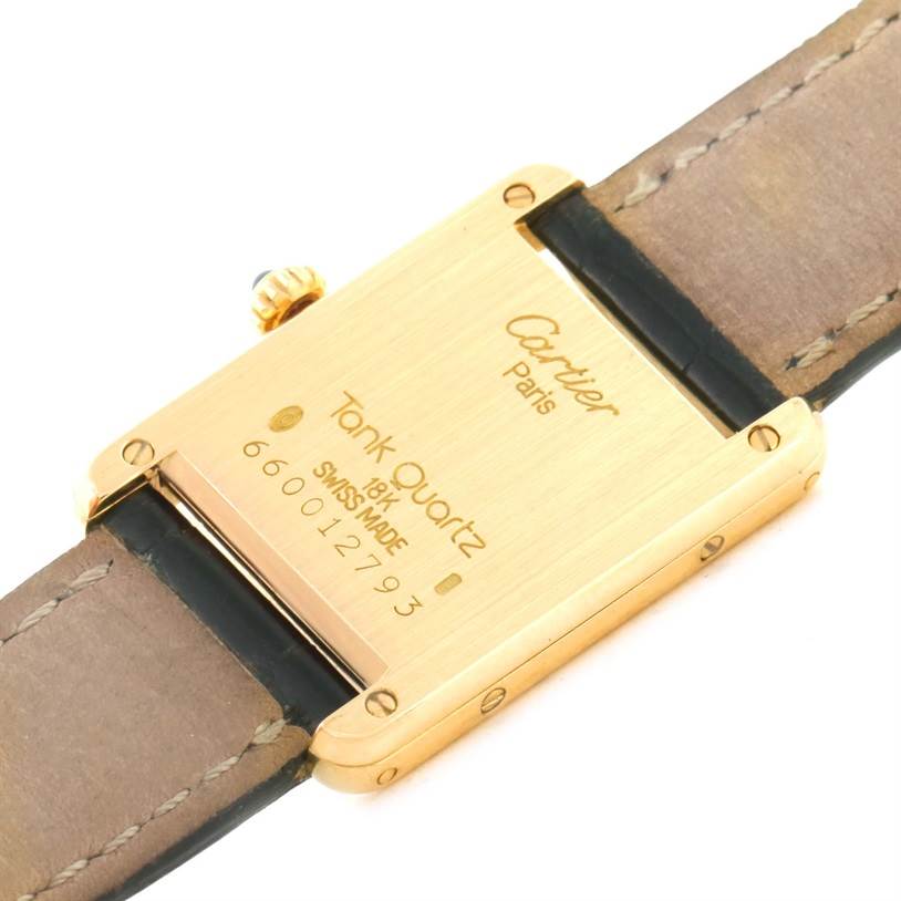 The image shows the back case and strap attachment of a Cartier Tank Classic Women's Yellow Gold White Dial Women's Yellow Gold White Dial watch.