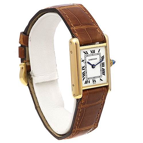 The image shows a Cartier Tank Classic Women's Yellow Gold White Dial Women's Yellow Gold White Dial watch shot from a front angle, displaying the face and brown leather strap.