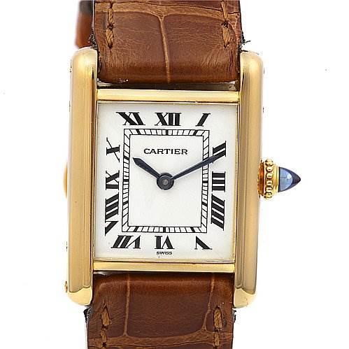Front view of a Cartier Tank Classic Women's Yellow Gold White Dial Women's Yellow Gold White Dial watch, showing its gold case, Roman numeral dial, and brown leather strap.