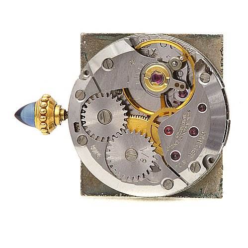 This image shows the inner mechanical movement of the Cartier Tank Classic Women's Yellow Gold White Dial Women's Yellow Gold White Dial watch, viewed from a top-down angle.