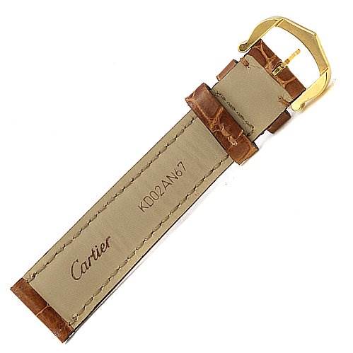 The image shows a close-up of the brown leather strap and gold buckle for a Cartier Tank Classic Women's Yellow Gold White Dial Women's Yellow Gold White Dial watch.