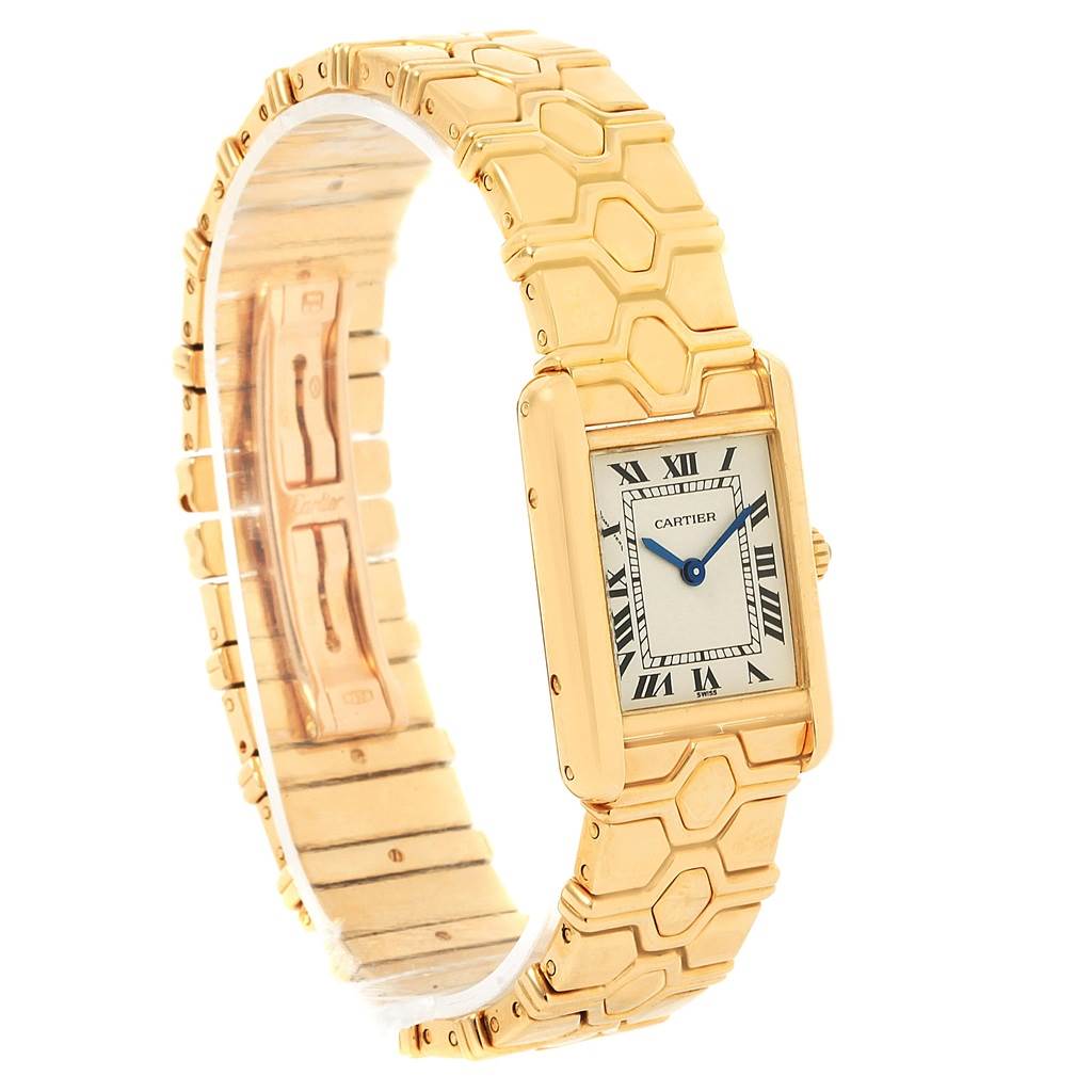 The image shows a Cartier Tank Classic Women's Yellow Gold Silver Dial Women's Yellow Gold Silver Dial watch from an angled side view, highlighting the watch face, bracelet, and clasp.