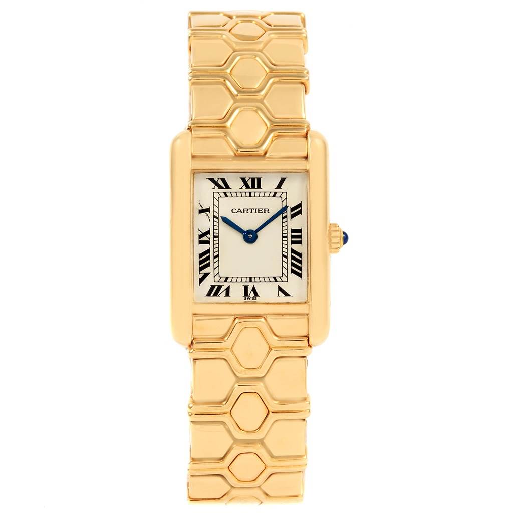 The image shows a front view of a Cartier Tank Classic Women's Yellow Gold Silver Dial Women's Yellow Gold Silver Dial watch, highlighting its face and ornate gold bracelet.