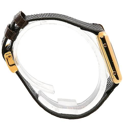 This side view of the Cartier Tank Classic Women's Yellow Gold Brown Dial Women's Yellow Gold Brown Dial watch shows the gold case, black strap, and buckle.