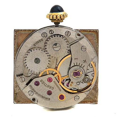 This image shows the movement and internal gears of the Tank Classic model by Cartier, viewed from the back.