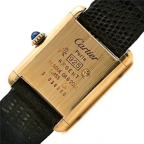 The image shows the back and side of a Cartier Tank Classic Women's Yellow Gold Brown Dial Women's Yellow Gold Brown Dial watch, highlighting the case and part of the black leather strap.