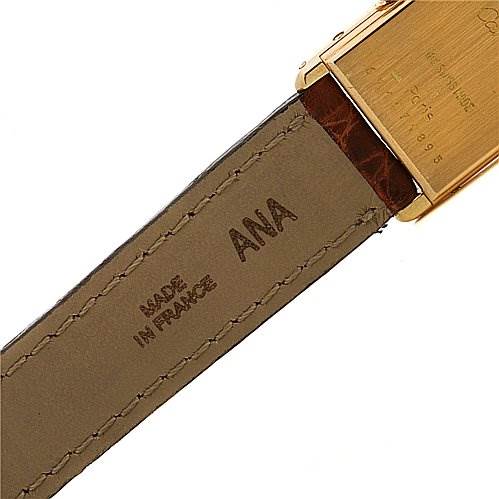 This image shows the back view of the watch strap and part of the case of the Cartier Tank Classic Women's Yellow Gold White Dial Women's Yellow Gold White Dial model.