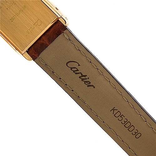 This image shows the back of the Tank Classic model by Cartier, focusing on the leather strap and part of the watch case.
