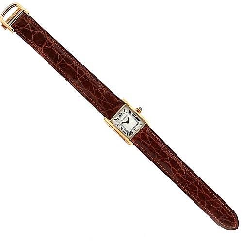 The image shows a top-down view of the Cartier Tank Classic Women's Yellow Gold White Dial Women's Yellow Gold White Dial watch featuring its face, case, and brown leather strap.