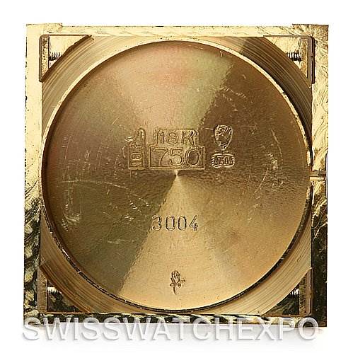 The image shows the back case of a Tank Classic model watch by Cartier, displaying hallmark and 750 markings.