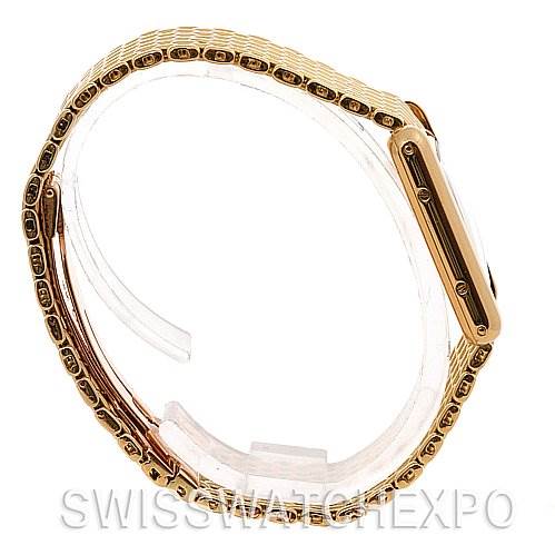 The image shows a side view of the Cartier Tank Classic Women's Yellow Gold White Dial Women's Yellow Gold White Dial watch, highlighting its gold bracelet and slim profile.