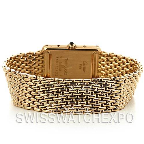 The Cartier Tank Classic Women's Yellow Gold White Dial Women's Yellow Gold White Dial watch is shown from the rear, highlighting its back case and gold bracelet.