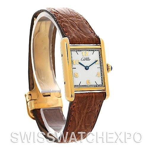 The image shows a Cartier Tank Classic Women's Yellow Gold White Dial Women's Yellow Gold White Dial watch from an angled side view, highlighting its rectangular face and leather strap.