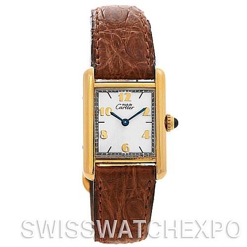The image shows a Cartier Tank Classic Women's Yellow Gold White Dial Women's Yellow Gold White Dial watch front-on, highlighting its rectangular dial, gold casing, and brown leather strap.