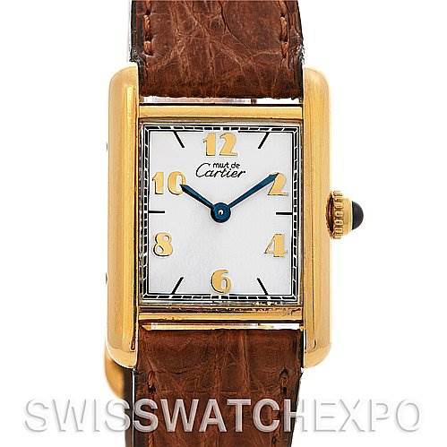 The image shows a front view of a Cartier Tank Classic Women's Yellow Gold White Dial Women's Yellow Gold White Dial watch with a gold case and brown leather strap.