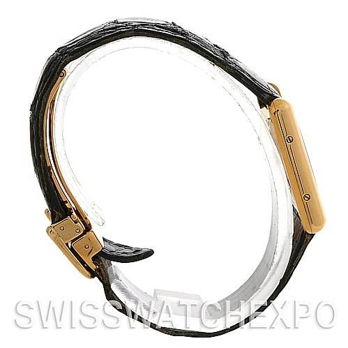 Side view of the Cartier Tank Classic Women's Yellow Gold Beige Dial Women's Yellow Gold Beige Dial watch, showcasing the case, crown, and leather strap.