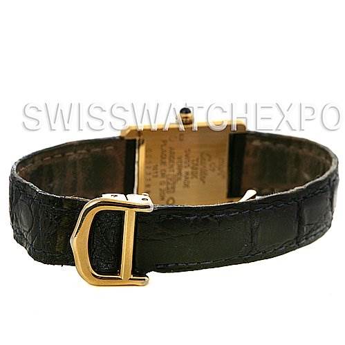 The image shows the back of a Cartier Tank Classic Women's Yellow Gold Beige Dial Women's Yellow Gold Beige Dial watch, highlighting the leather strap and gold clasp.