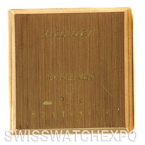 This image shows the back case of a Cartier Tank Classic Women's Yellow Gold White Dial Women's Yellow Gold White Dial watch, displaying its branding and manufacturing details.