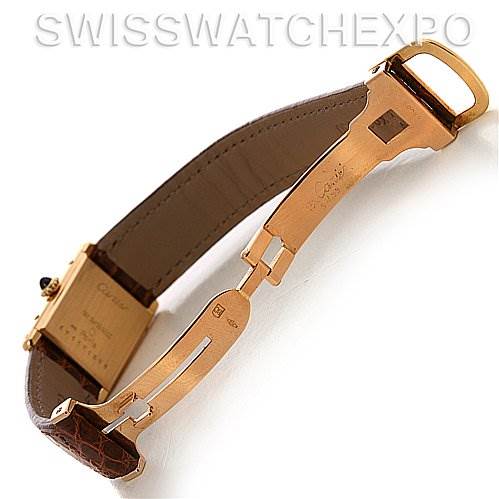 This image shows the back view of a Cartier Tank Classic Women's Yellow Gold White Dial Women's Yellow Gold White Dial watch, focusing on the clasp and leather strap.