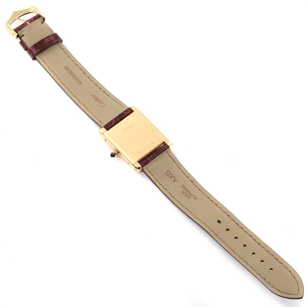 The image shows the back view of a Cartier Tank Classic Women's Yellow Gold White Dial Women's Yellow Gold White Dial watch, including the case, strap, and buckle.