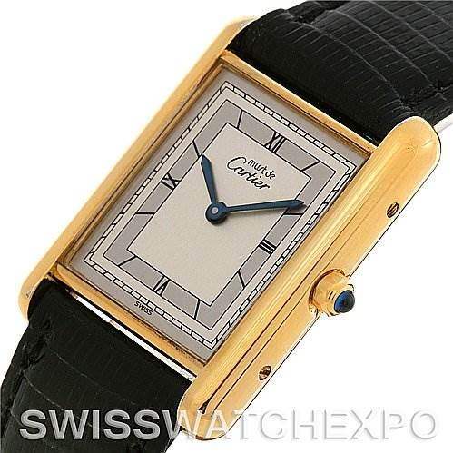 The image shows a Cartier Tank Classic Yellow Gold Silver Dial Yellow Gold Silver Dial watch at a slight angle, displaying the face, case, and part of the strap.