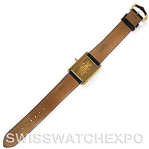 The image shows the back view of a Tank Classic model by Cartier, displaying the case and leather strap.