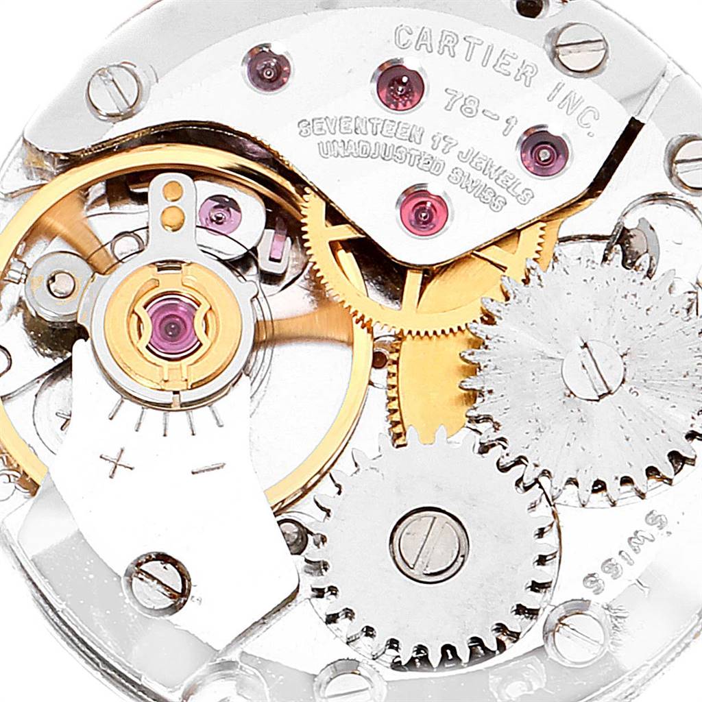 The image shows a close-up angle of the inner mechanical movement of the Cartier Tank Classic Women's Yellow Gold White Dial Women's Yellow Gold White Dial watch.