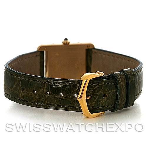 The image shows the back and clasp of a Tank Classic watch by Cartier, highlighting the strap and buckle.