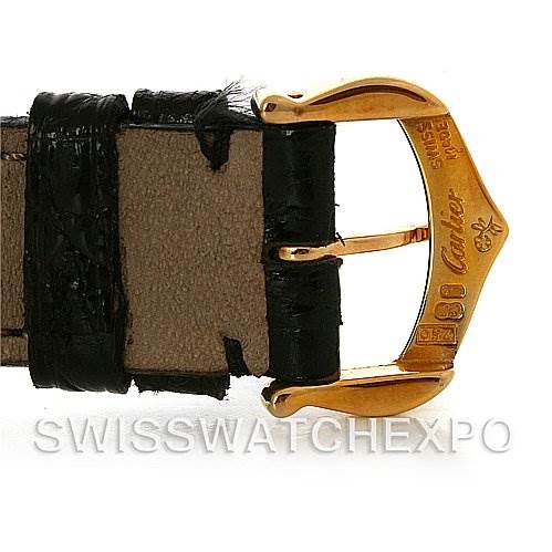 This image shows a close-up of the buckle and strap of a Cartier Tank Classic Women's Yellow Gold White Dial Women's Yellow Gold White Dial watch.