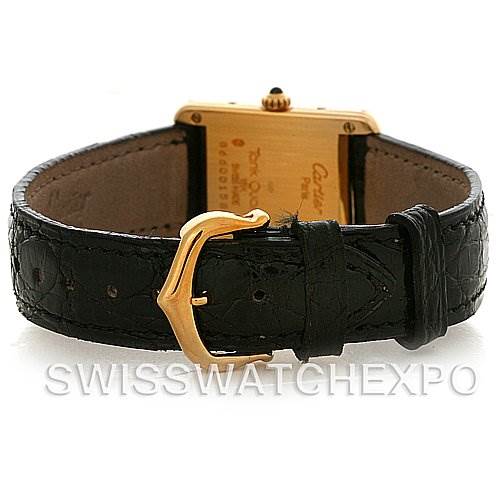 The image shows the back view of the Cartier Tank Classic Women's Yellow Gold White Dial Women's Yellow Gold White Dial watch, highlighting the leather strap and buckle.