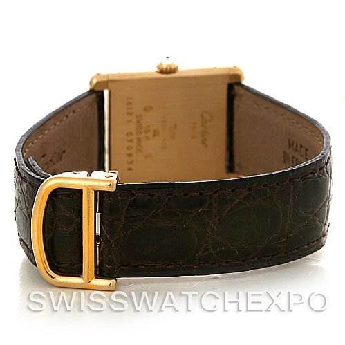 The image shows the back view of a Cartier Tank Classic C70934 Yellow Gold Silver Dial C70934 Yellow Gold Silver Dial watch, highlighting the clasp and strap.