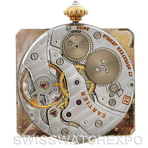 This image shows the internal movement mechanism of a Cartier Tank Classic C70934 Yellow Gold Silver Dial C70934 Yellow Gold Silver Dial watch, captured from the back angle.
