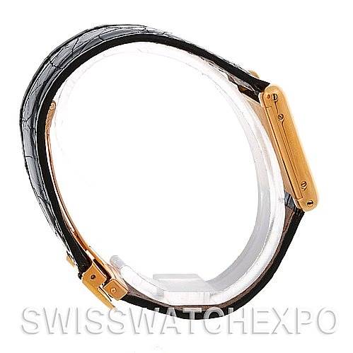 The image shows a side view of the strap and case of a Cartier Tank Classic Women's Yellow Gold White Dial Women's Yellow Gold White Dial watch.