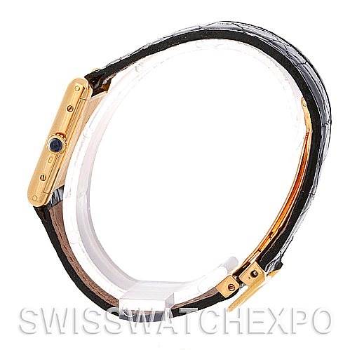 This image shows a side view of the Cartier Tank Classic Women's Yellow Gold White Dial Women's Yellow Gold White Dial watch, displaying its casing, crown, and leather strap.