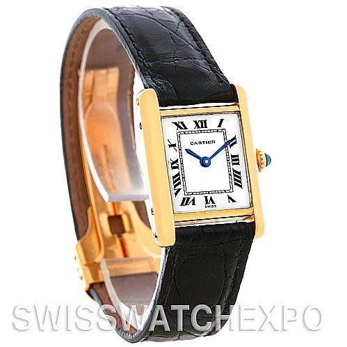 The image shows a Cartier Tank Classic Women's Yellow Gold White Dial Women's Yellow Gold White Dial watch at an angled view, highlighting the watch face, strap, and side details.