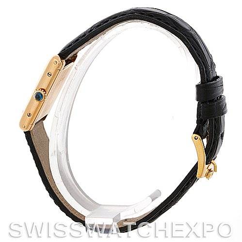 This image shows a side profile of the Cartier Tank Classic Women's Yellow Gold White Dial Women's Yellow Gold White Dial watch, highlighting the crown, case, and leather strap.