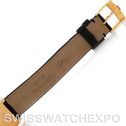 This image shows the back of the leather strap and gold buckle of the Cartier Tank Classic Women's Yellow Gold White Dial Women's Yellow Gold White Dial watch.