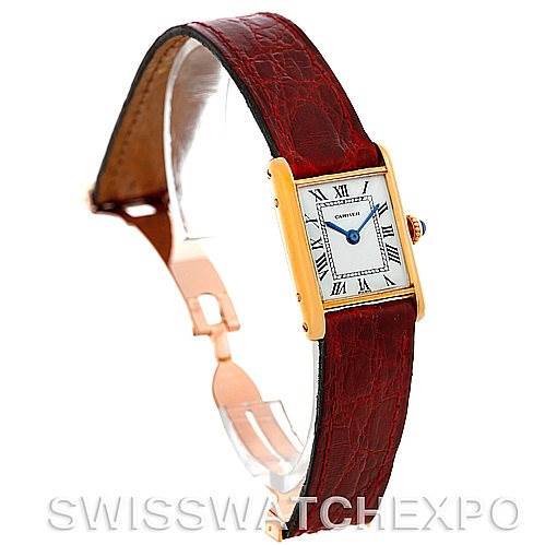 The image shows a side angle view of the Cartier Tank Classic Women's Yellow Gold White Dial Women's Yellow Gold White Dial watch featuring its rectangular dial and leather strap.