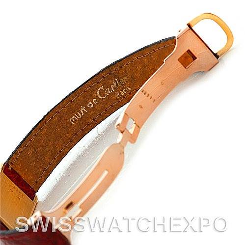 The image shows a close-up of the clasp and inner leather strap of a Cartier Tank Classic Women's Yellow Gold White Dial Women's Yellow Gold White Dial watch.