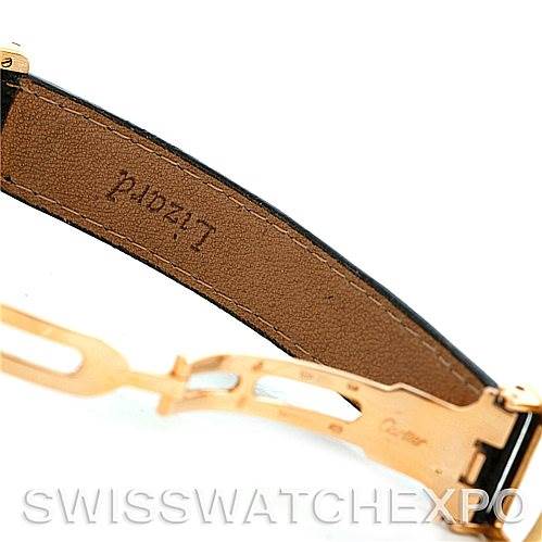 This image shows the inside view of the leather strap and clasp of a Cartier Tank Classic Women's Yellow Gold Silver Dial Women's Yellow Gold Silver Dial watch.