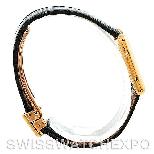 The image shows the side profile of the Cartier Tank Classic Women's Yellow Gold Silver Dial Women's Yellow Gold Silver Dial watch, highlighting the side case and leather strap.