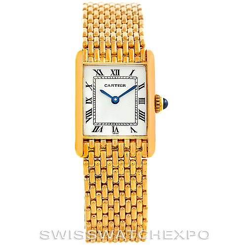 This image shows a front view of the Cartier Tank Classic Women's Yellow Gold Silver Dial Women's Yellow Gold Silver Dial watch, featuring a gold bracelet and Roman numeral dial.