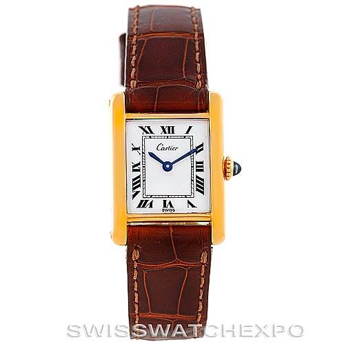 This image shows a Cartier Tank Classic Women's Yellow Gold White Dial Women's Yellow Gold White Dial watch from a front angle, displaying its face, case, and leather strap.