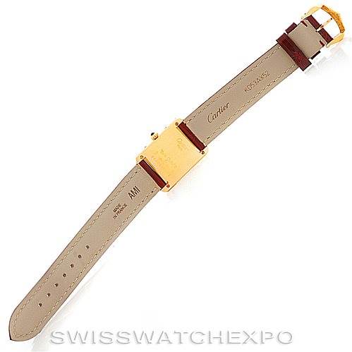 The image shows the rear and interior side of the strap and buckle of a Cartier Tank Classic Women's Yellow Gold White Dial Women's Yellow Gold White Dial model watch.
