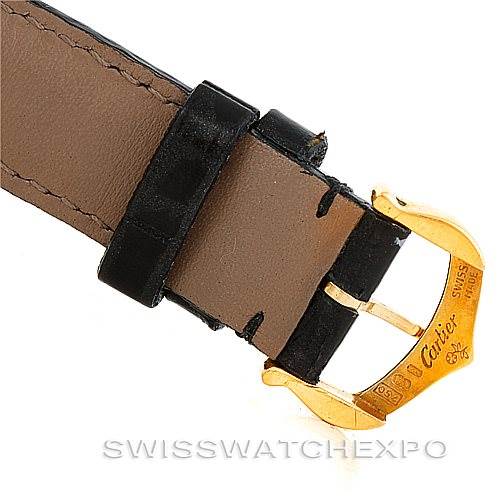 The image shows a close-up of the buckle and strap of a Cartier Tank Classic Women's Yellow Gold Silver Dial Women's Yellow Gold Silver Dial watch.