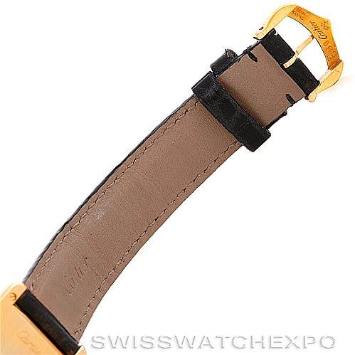 This image shows the leather strap and gold buckle of a Cartier Tank Classic Women's Yellow Gold Silver Dial Women's Yellow Gold Silver Dial watch, viewed from the inner side.