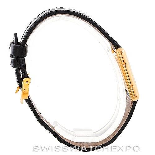 The image shows a side profile of the Cartier Tank Classic Women's Yellow Gold Silver Dial Women's Yellow Gold Silver Dial watch, highlighting the strap and case.