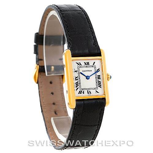 The image shows a front angle view of the Cartier Tank Classic Women's Yellow Gold Silver Dial Women's Yellow Gold Silver Dial watch, highlighting its face, case, and black leather strap.