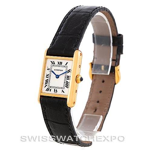 The image shows a front and side view of a Cartier Tank Classic Women's Yellow Gold Silver Dial Women's Yellow Gold Silver Dial watch with a black leather strap and gold casing.